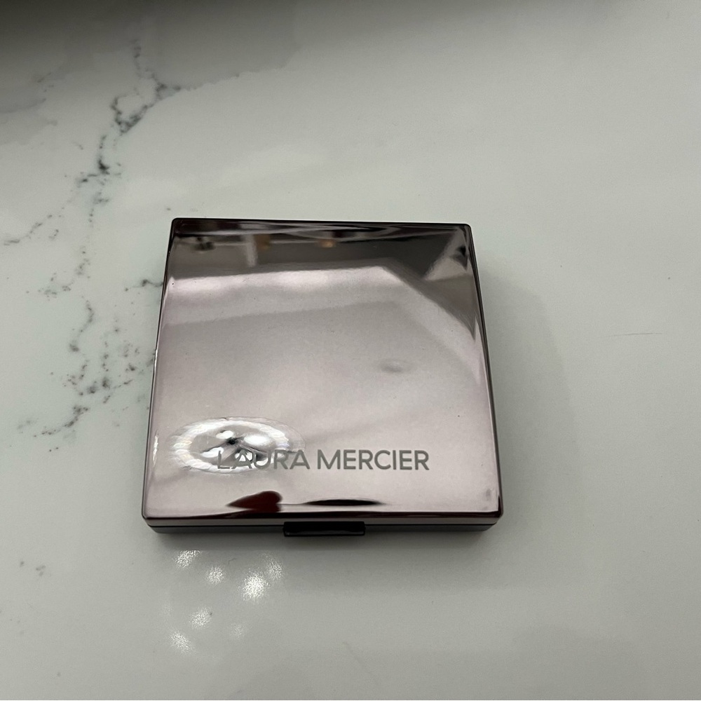 Laura Mercier Silver Lipstick Sleek Metallic Design